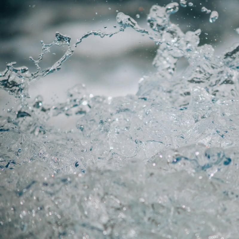 An image of water splashing. It is important to stay hydrated and practise good sleep hygiene when preparing for cancer treatment